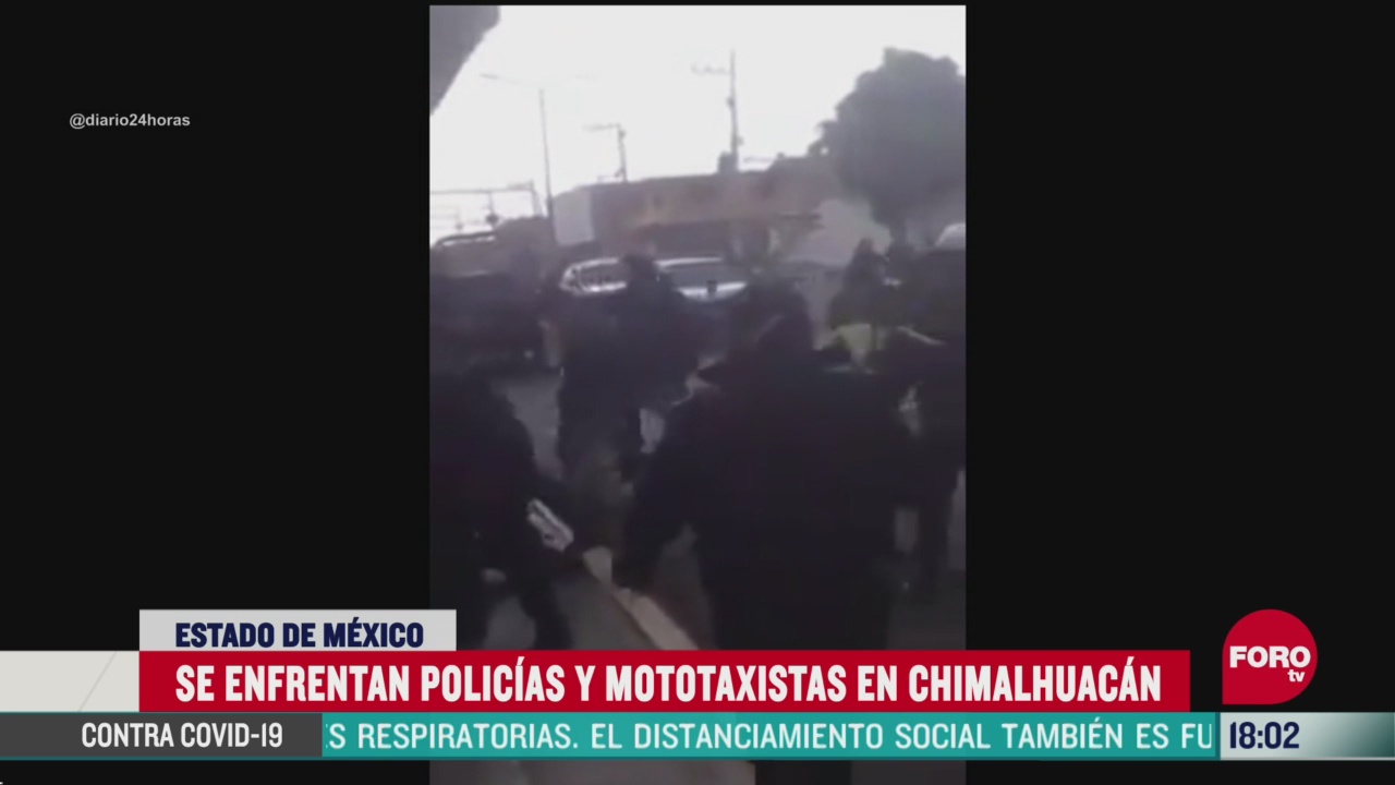 FOTO: se enfrentan policia y mototaxistas en chimalhuacan edomex