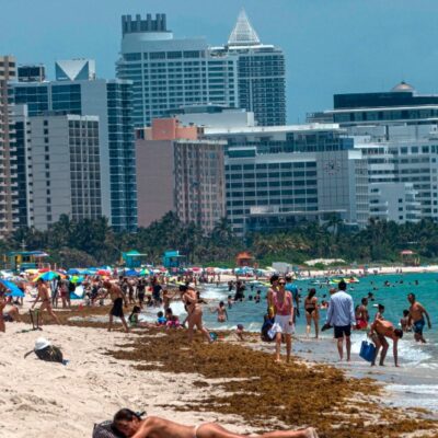 Tras cierre por COVID-19 reabren con restricciones playas en Miami, Florida