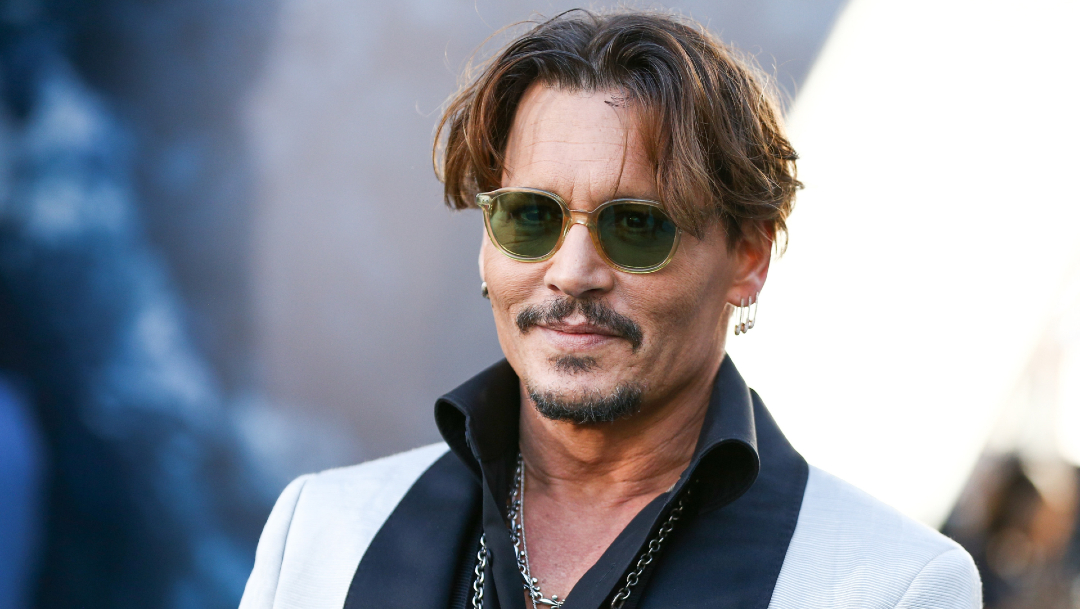 Johnny Depp niega haber abofeteado a su exesposa por reírse de su tatuaje