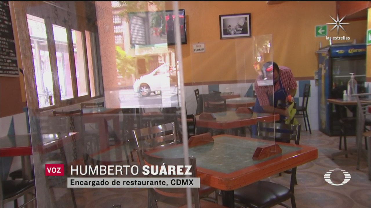 restaurantes de la cdmx reabre al 30 de su capacidad y colocan paneles de acrilico