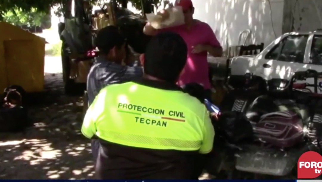 Arroyo arrastra a familia en Tecpan de Galeana, Guerrero; buscan a una menor