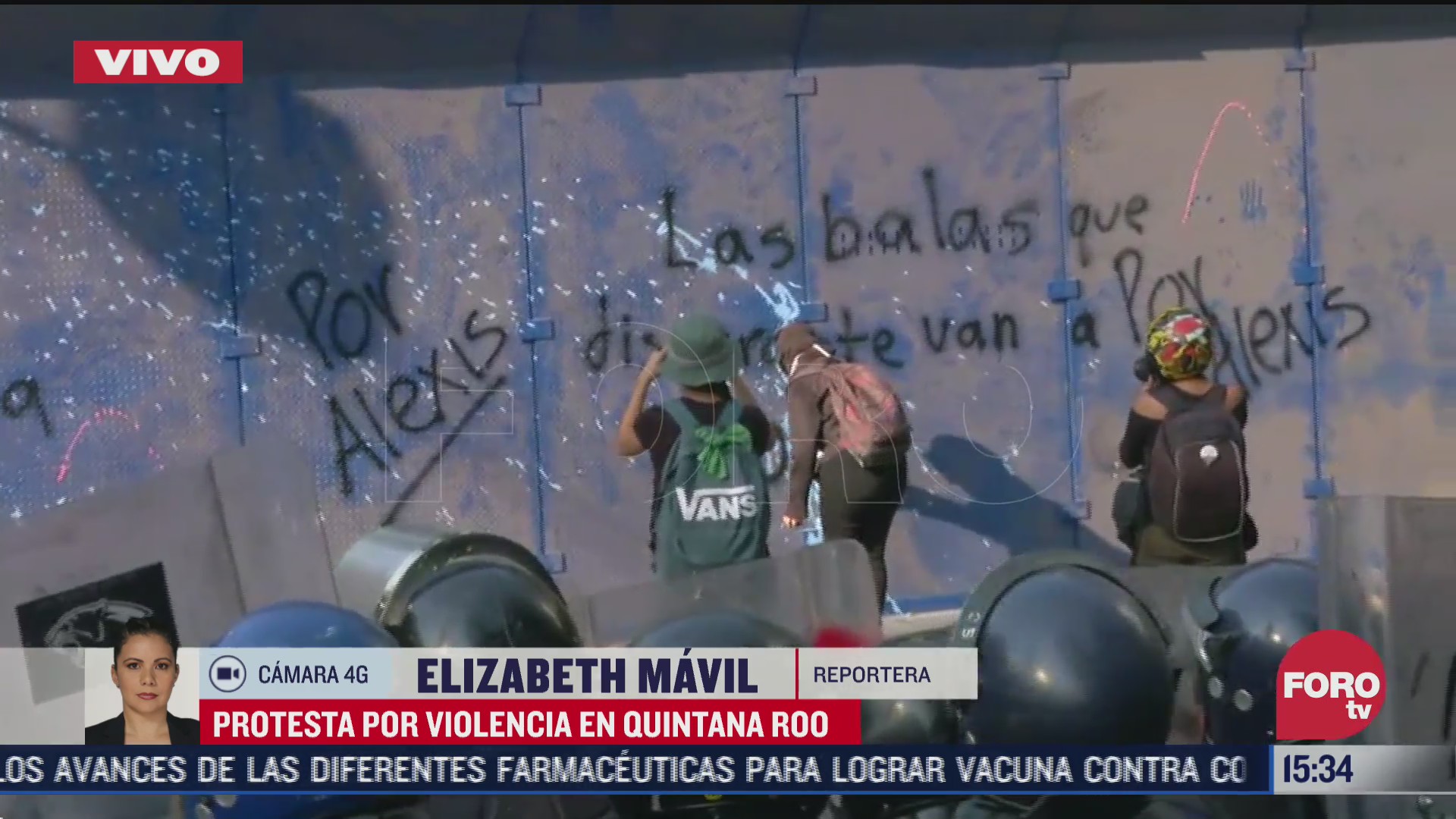 feministas arrojan liquidos y pintura a policias durante marcha por alexis