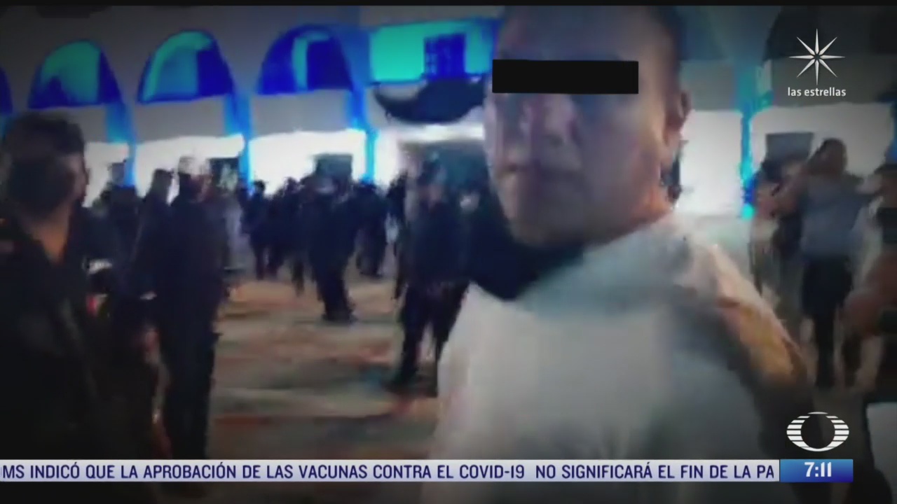 identifican a policia que disparo vestido de civil contra manifestantes en cancun