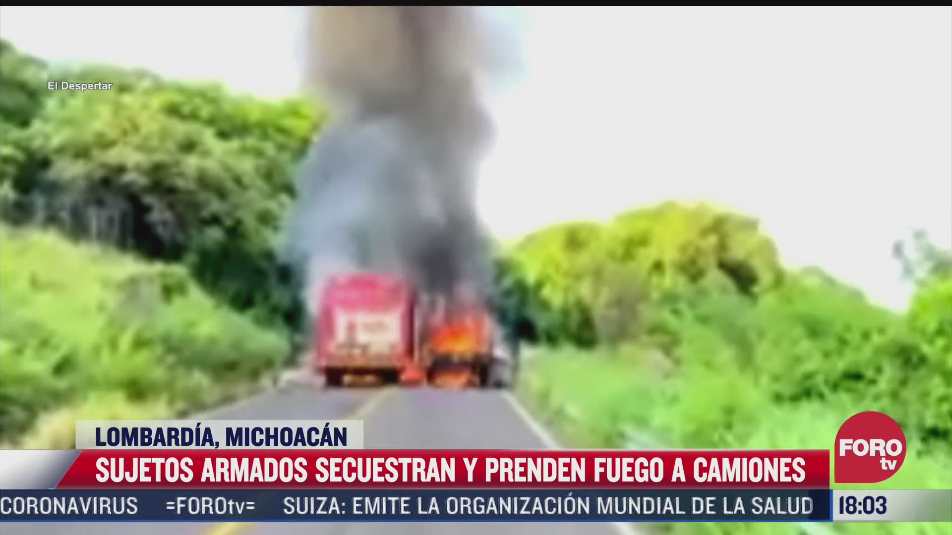 hombres armados secuestran y prenden fuego a camiones repartidores en michoacan