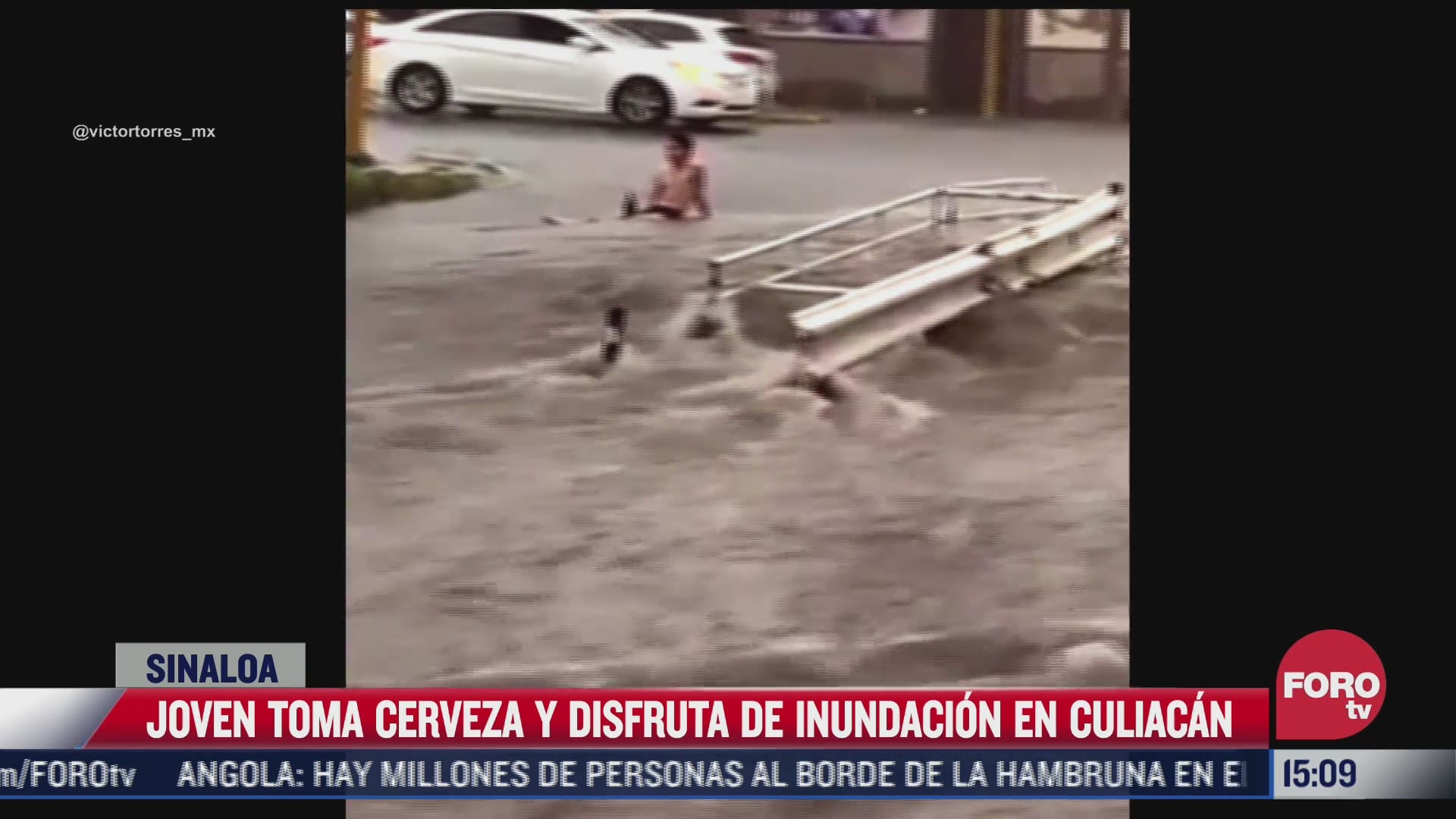 video joven toma cerveza y disfruta de inundacion en culiacan