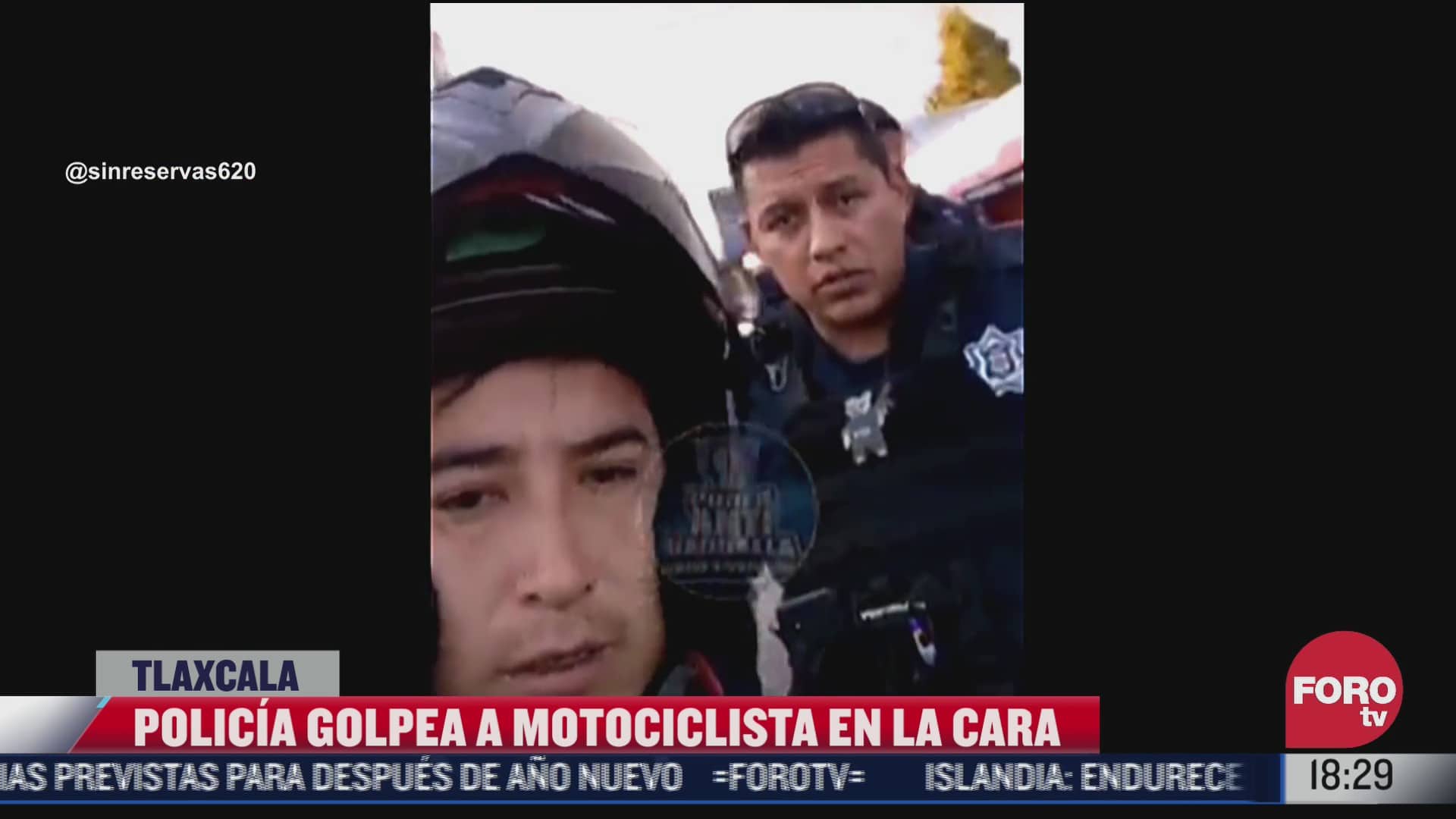 policia golpea a motociclista por grabarlo