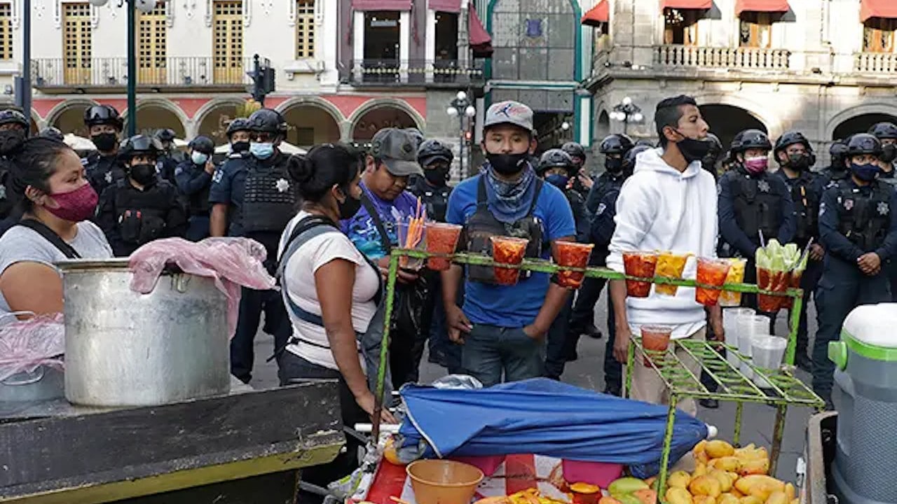 Enfrentamiento entre comerciantes y autoridades de Puebla (Econsulta)