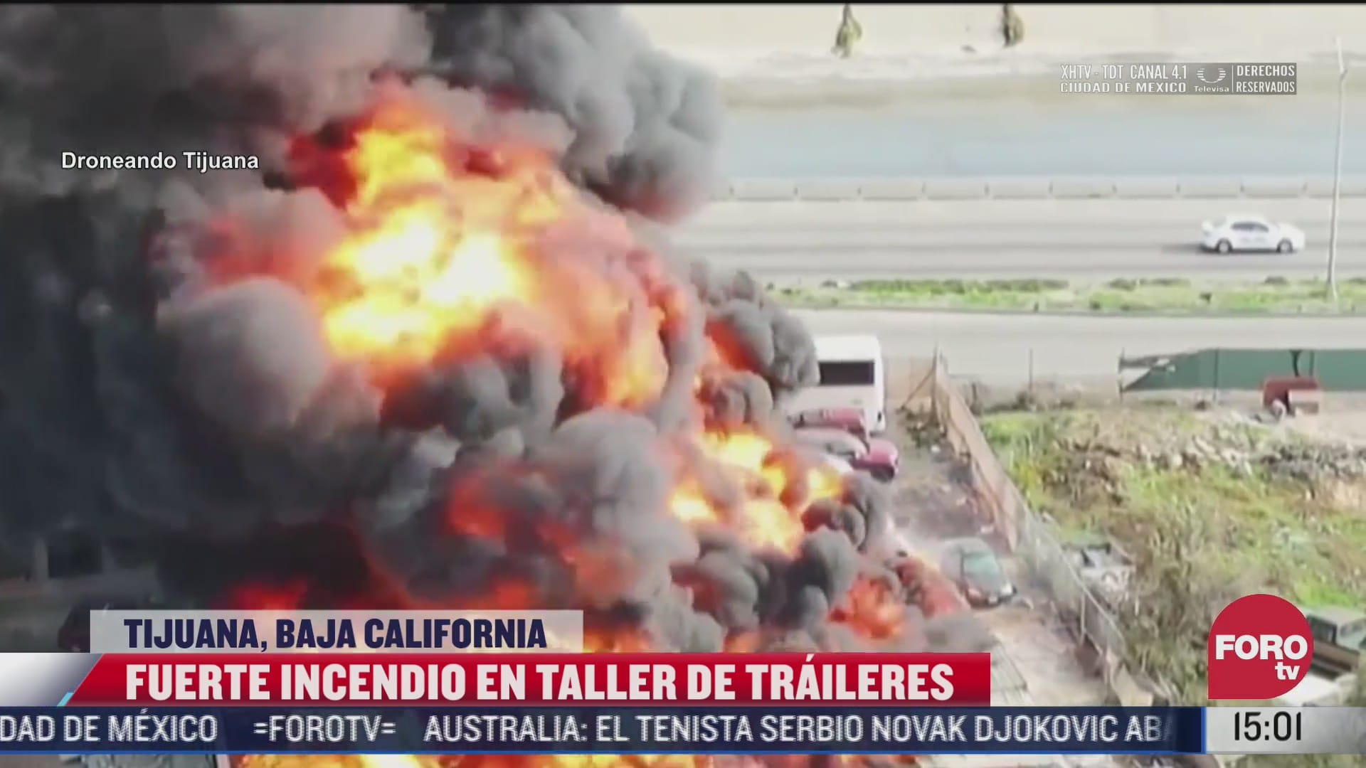 fuerte incendio en taller de traileres en tijuana