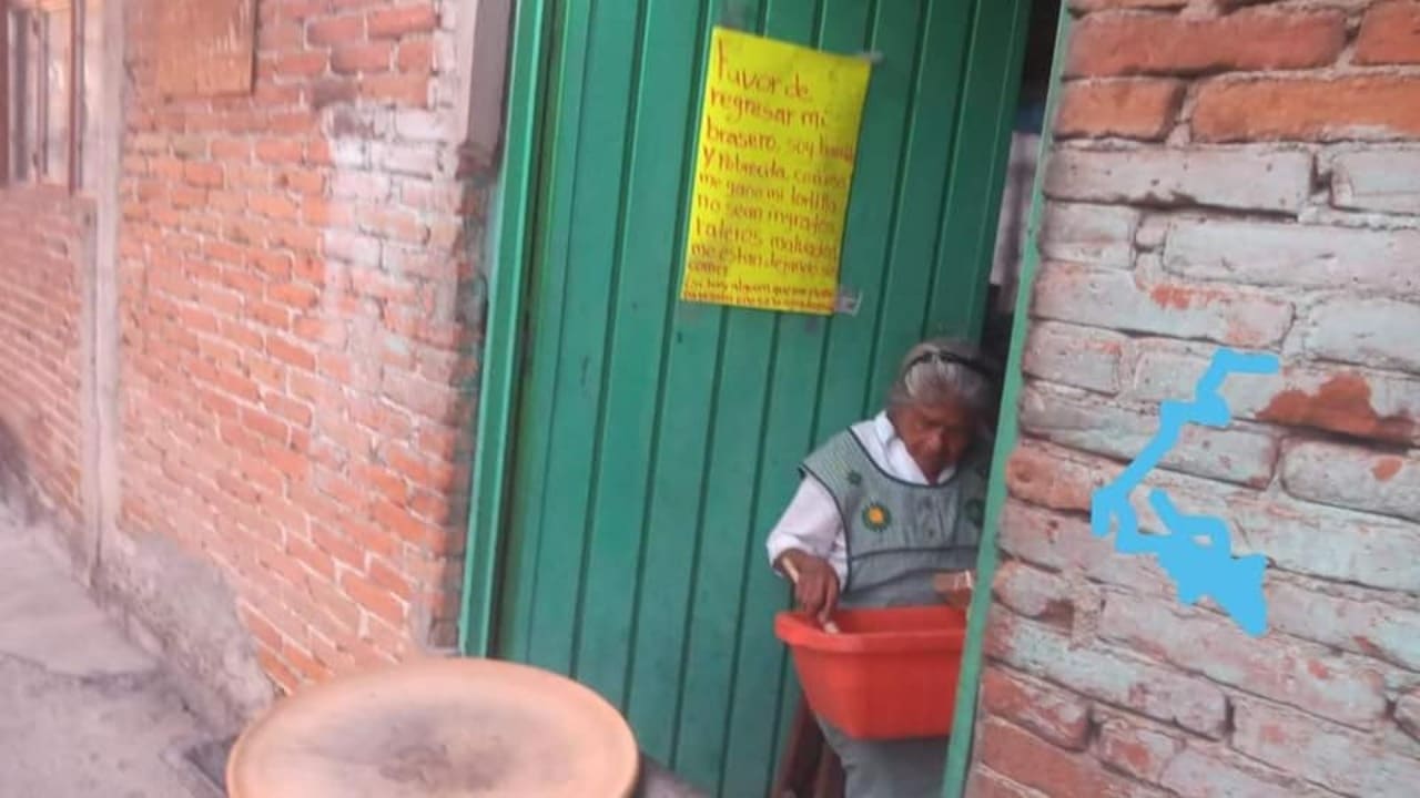 Roban brasero a anciana de Coatepec, Puebla y escribe cartel a ladrones