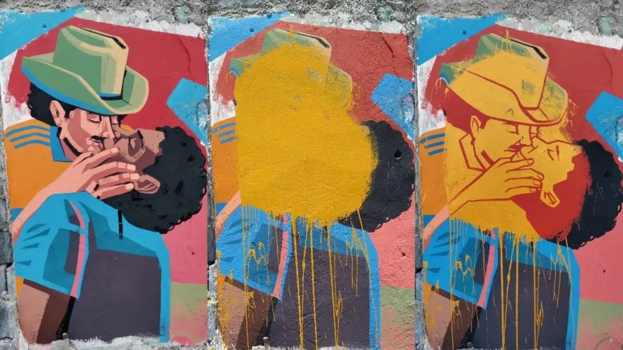 Restauran pintura de dos hombres besándose en Monterrey